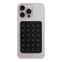 Juodas silikoninis Sticky Grip telefono laikiklis su 24 siurbtukais, prilipdytas prie paviršiaus